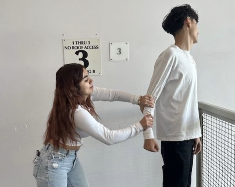 Seniors Mia Ruelas & Yahir Flores- Antillon know that communication is key and see each other as equal partners even when things get tough. They posed for us to show what to never do when your partner has something to share. 
